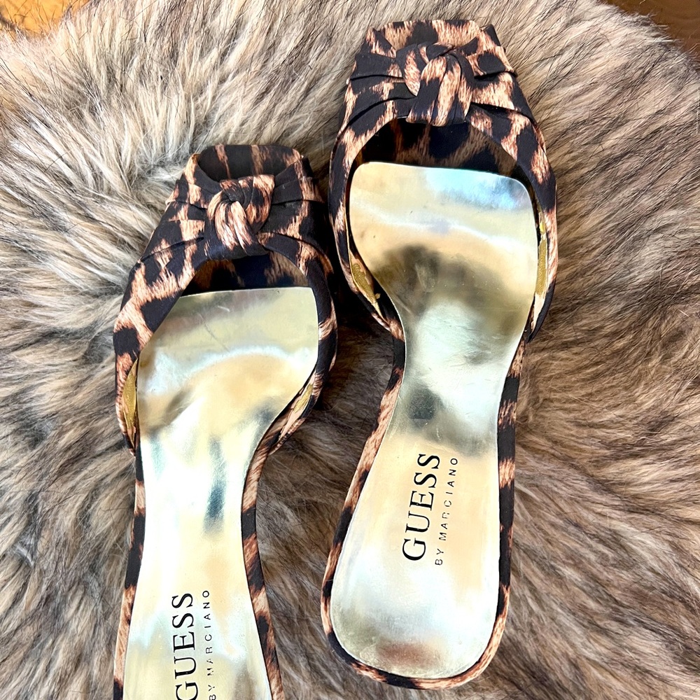 Guess brand peep toe mules. In mint condition.